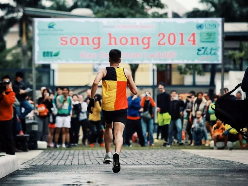 Coureur à la course Song Hong 2014, l'un des premiers événements photographiés par BIBPIX